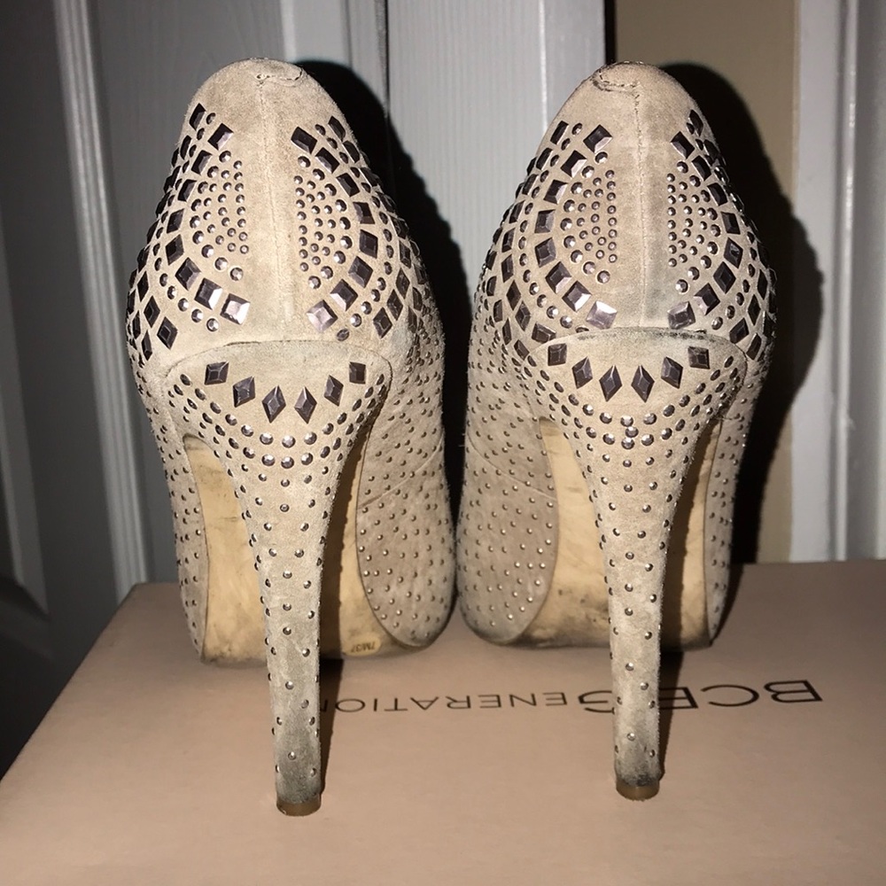 BCBG nude heels with hardware derail design